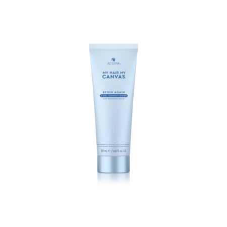 A tube of facial cleanser sitting on top of a white table.