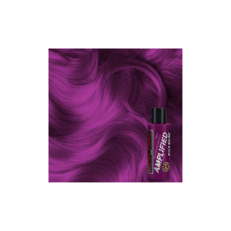 A bottle of hair dye next to a purple liquid.