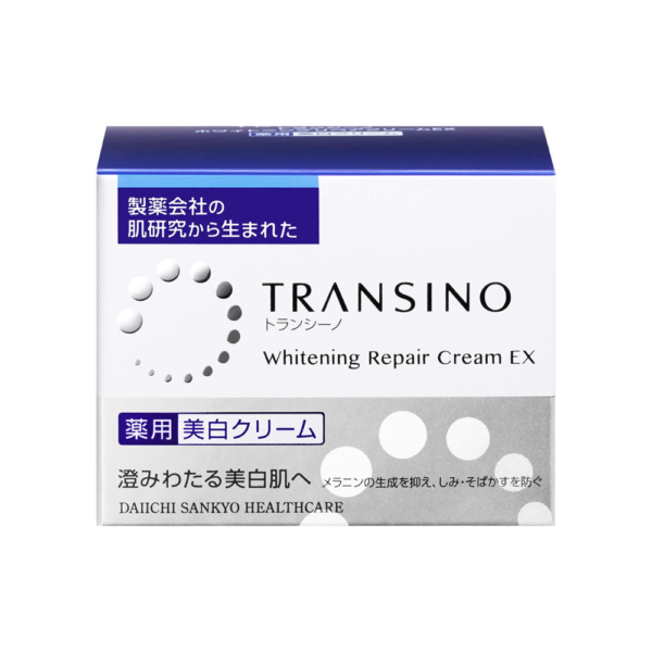 A box of cream with white dots on it.