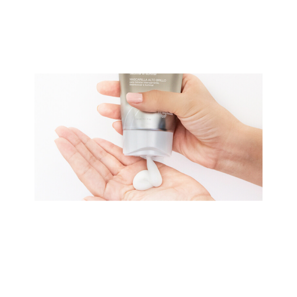 A person is putting lotion on their hands.