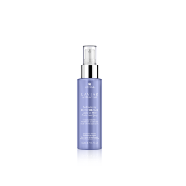 A bottle of facial mist with blue and silver cap.