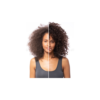 A woman with curly hair and no makeup.