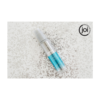 A bottle of eye serum sitting on top of a pile of snow.